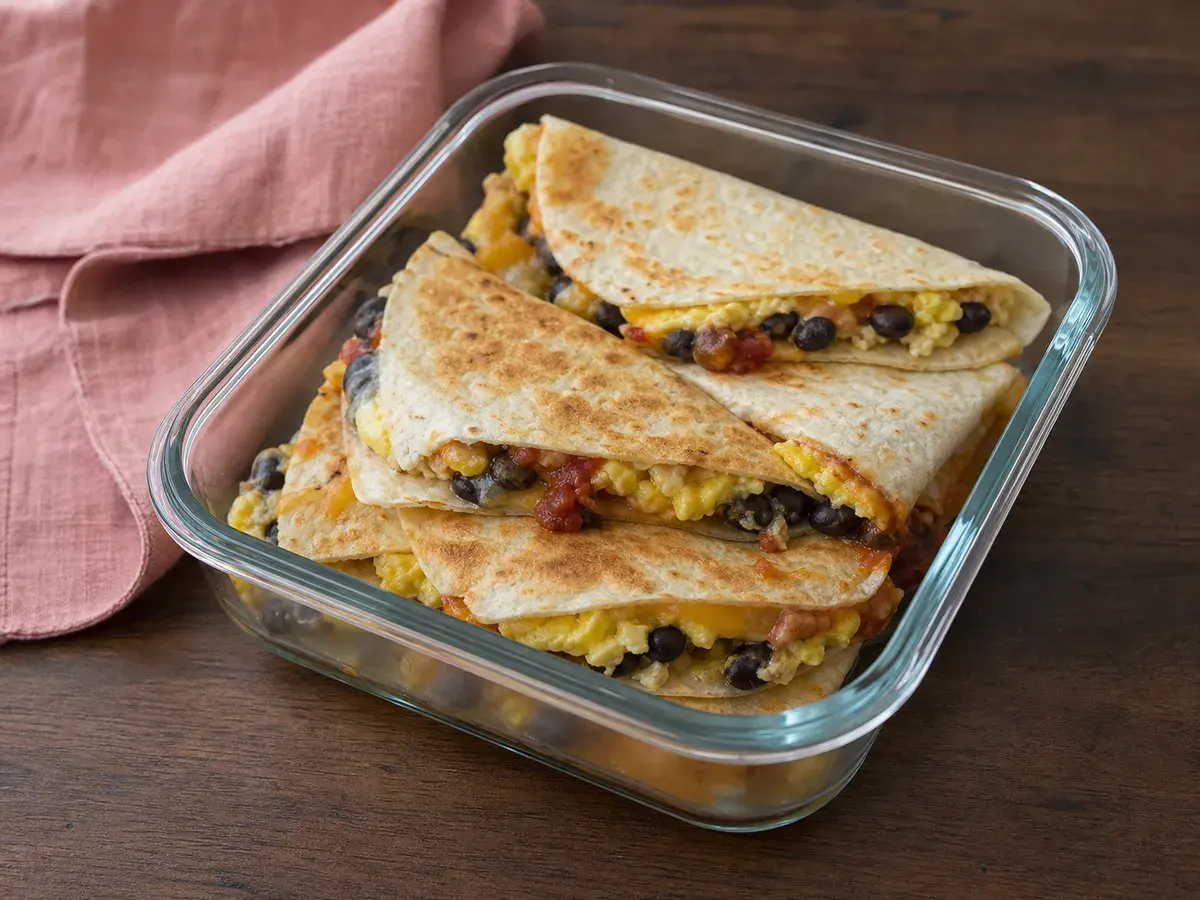 Illustrative image of bean and egg breakfast quesadilla wedges