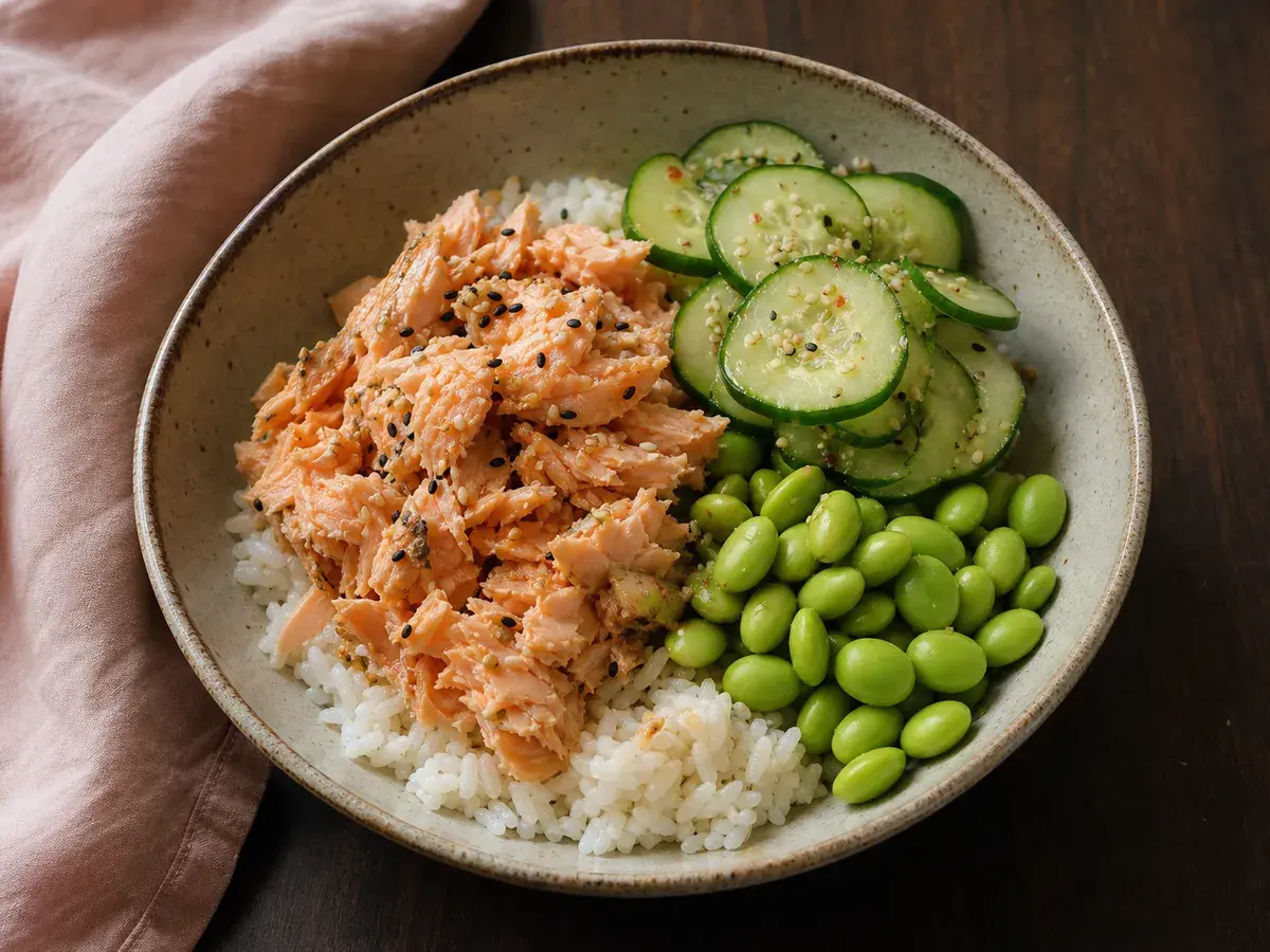 Illustrative image of salmon rice bowls with edamame and cucumber