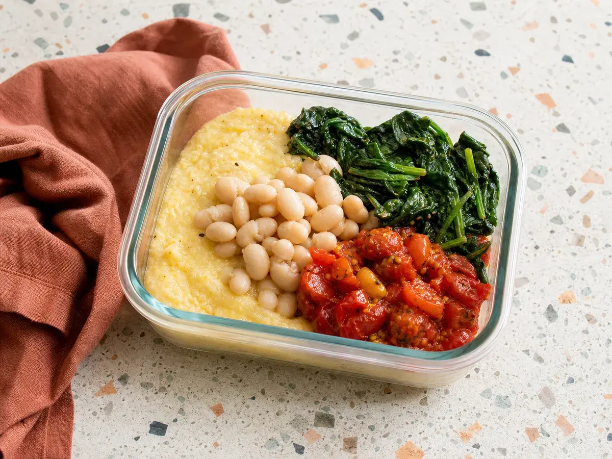 Illustrative image of white bean breakfast polenta with greens
