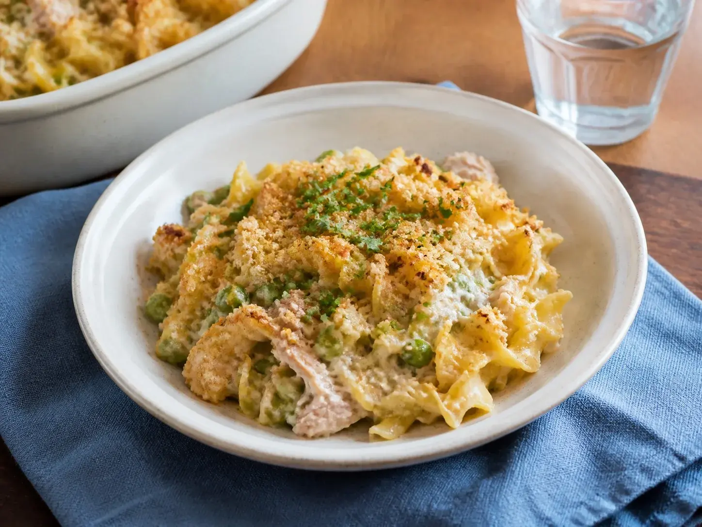 Illustrative image of tuna noodle casserole served in a simple everyday setting